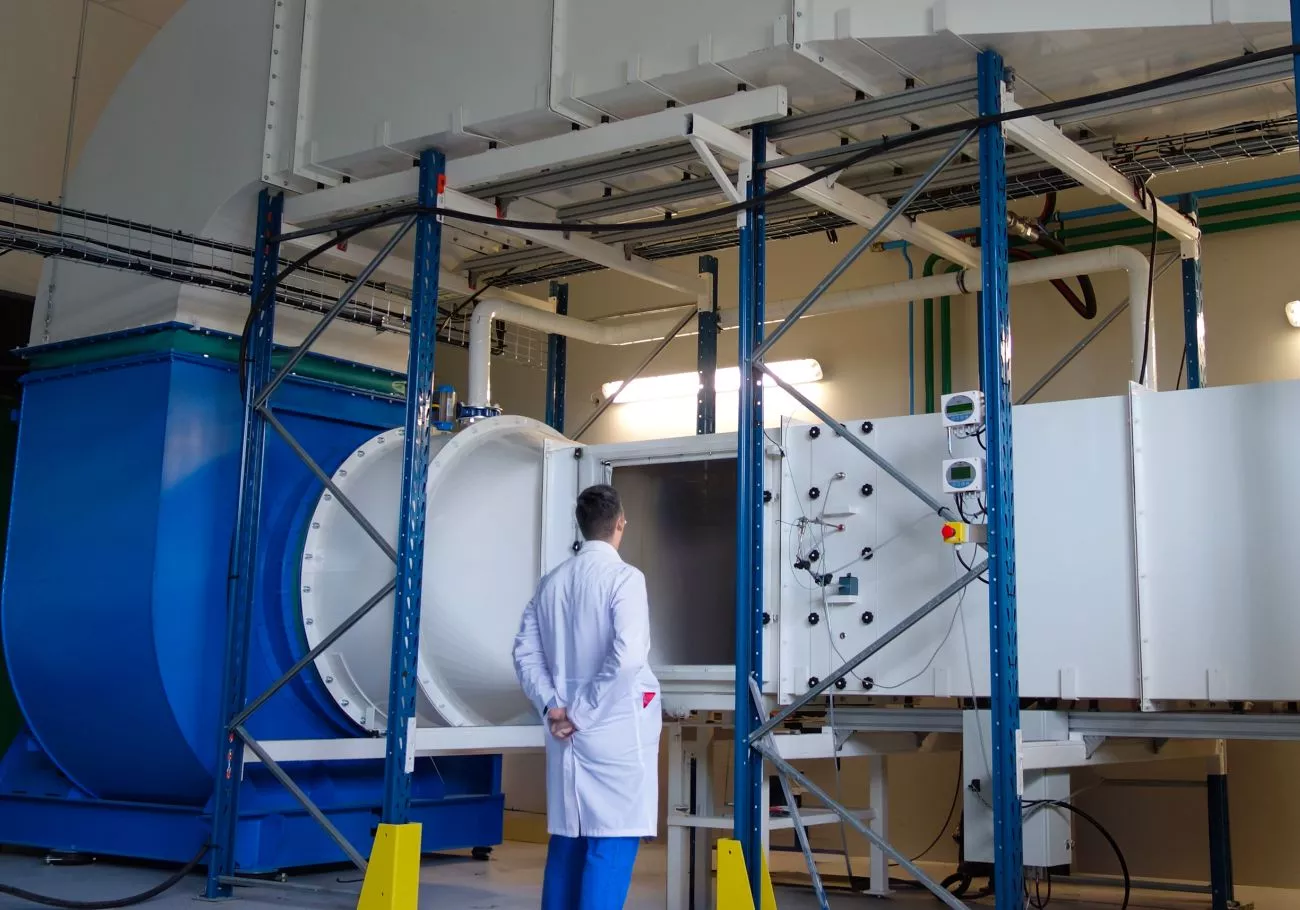Technician accessing the sand and dust test bench